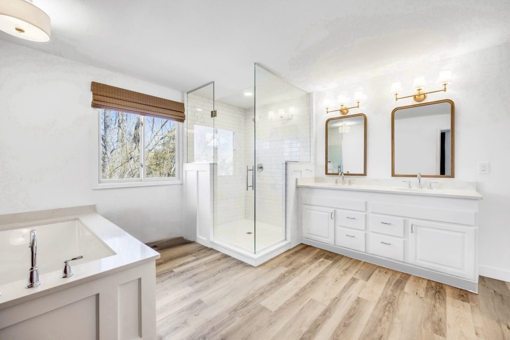 primary vs guest bathroom remodel Colorado Springs