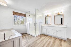 primary vs guest bathroom remodel Colorado Springs